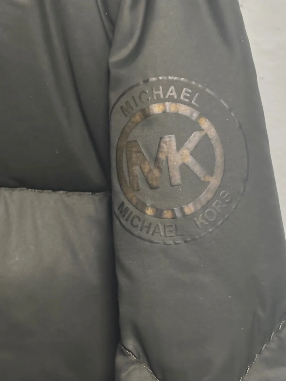Michael Kors Black Puffer Jacket with Subtle Brown MK Logo